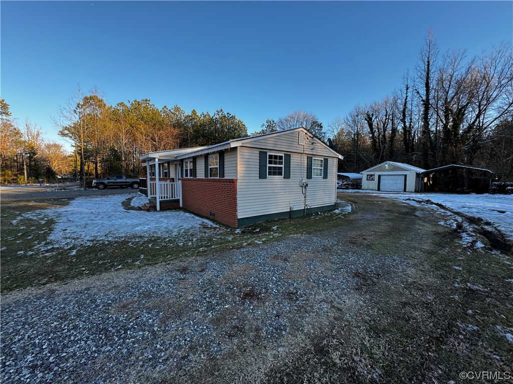 17096 Courtney Road Hanover, VA 23069 - Photo 17 of 27 a view of a house with a yard