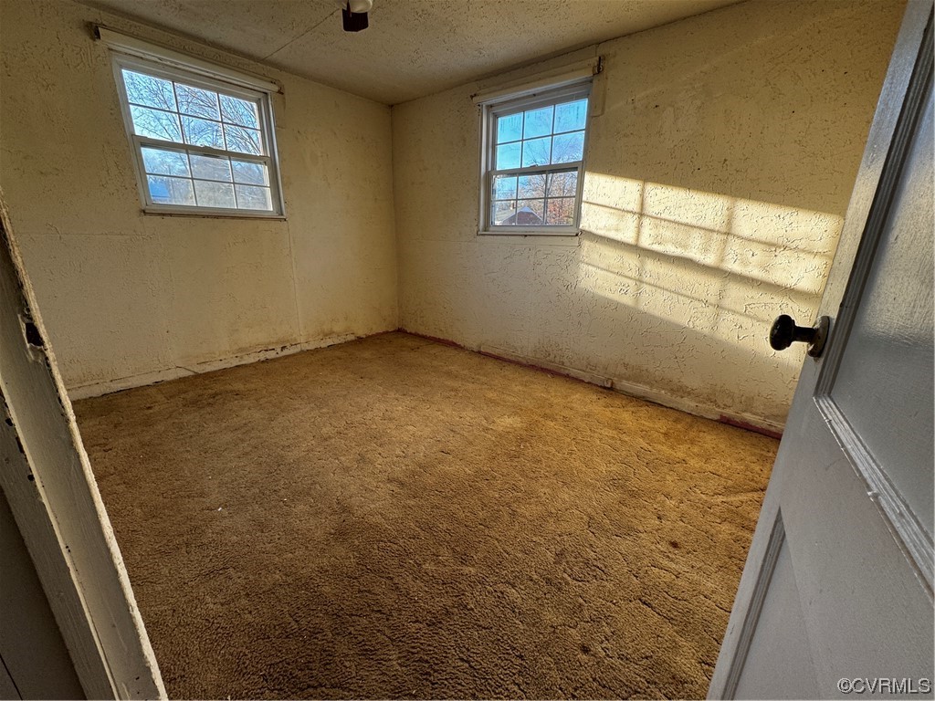 17096 Courtney Road Hanover, VA 23069 - Photo 19 of 27 a view of an empty room and a window