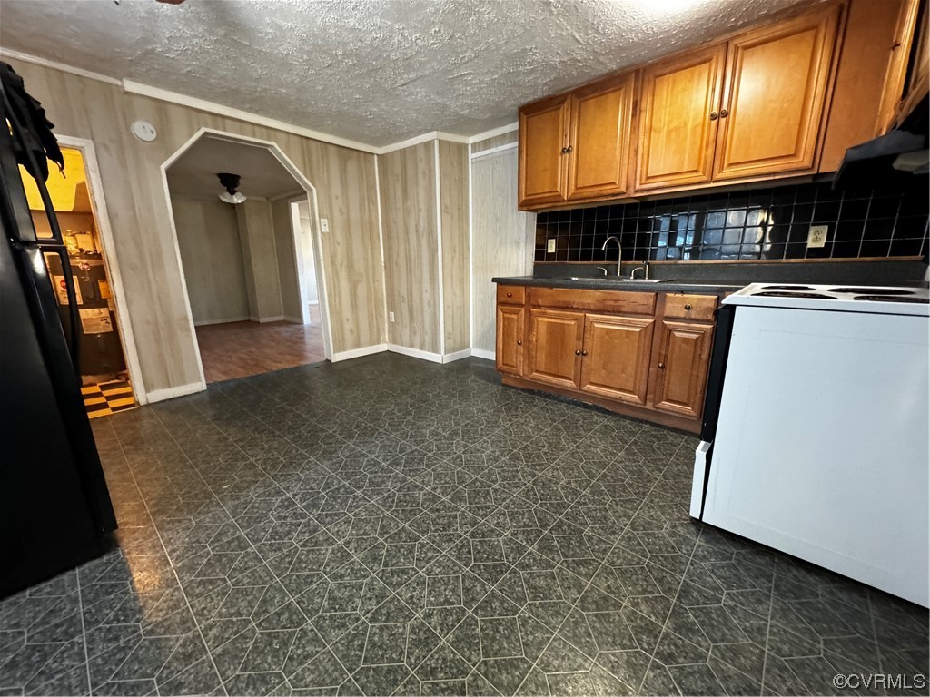 17096 Courtney Road Hanover, VA 23069 - Photo 3 of 27 a kitchen with granite countertop a sink a stove and a microwave