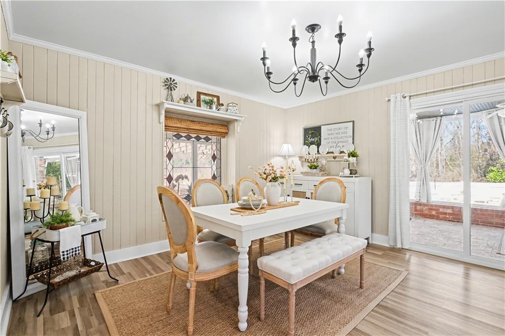 1833 Tom Odum Road Vidalia, GA 30474 - Photo 18 of 59 a view of a dining room with furniture window and wooden floor
