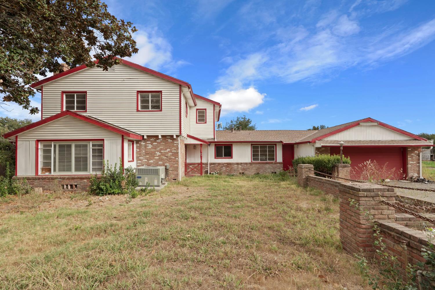 14371 Race Track Road Walnut Grove, CA 95690 - Photo 30 of 88 a front view of a house with a yard