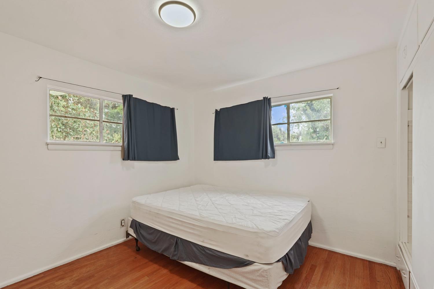 14371 Race Track Road Walnut Grove, CA 95690 - Photo 47 of 88 a room with a bed and a window