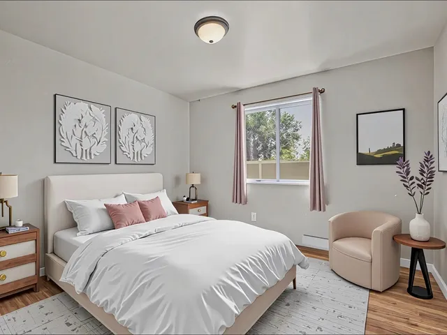 a bedroom with bed and a couch