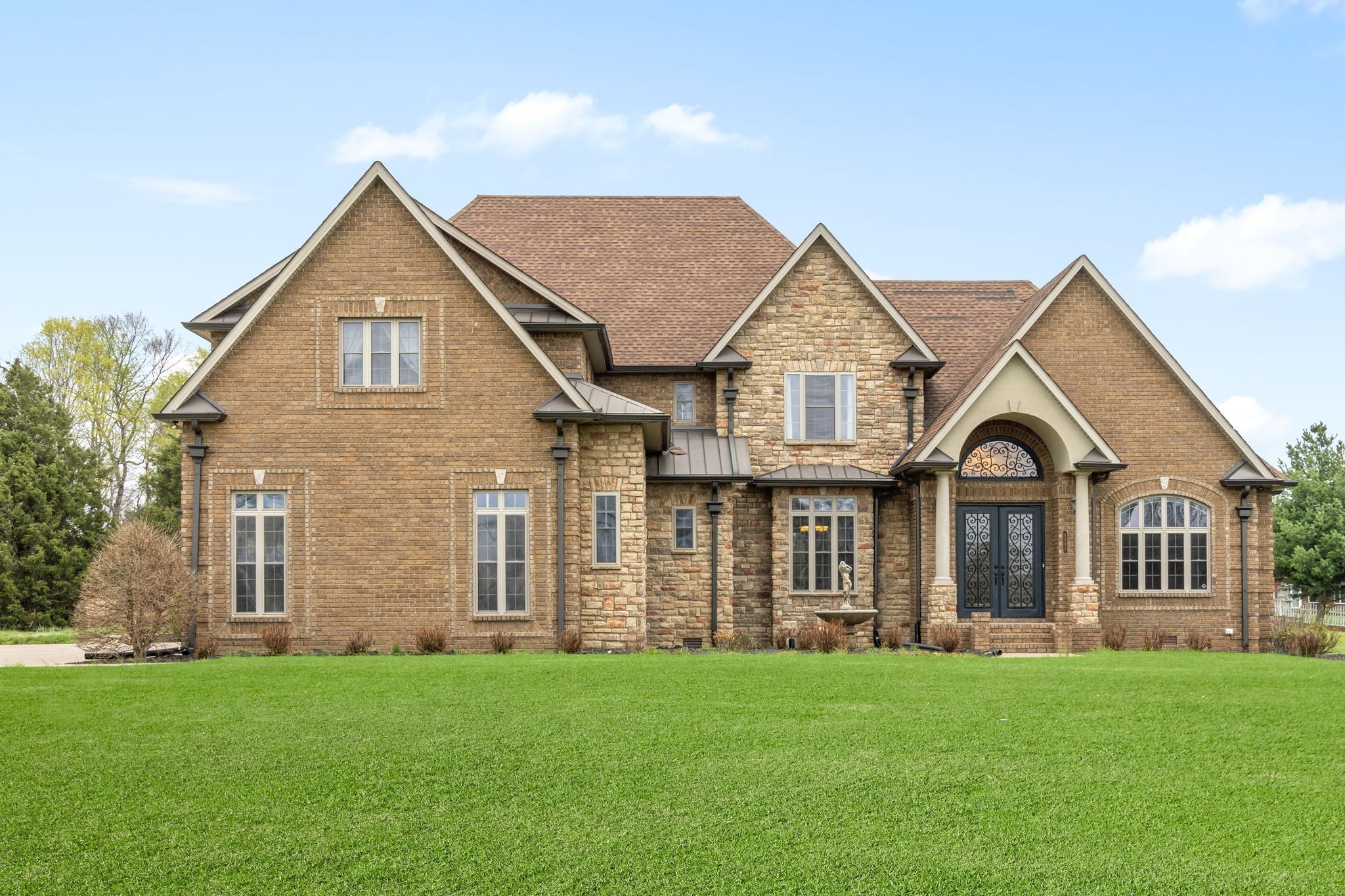 4591 Sango Road Clarksville, TN 37043 - Photo 2 of 70 front view of a house with a yard