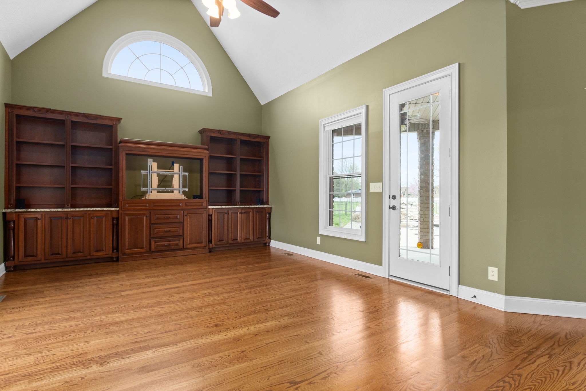 4591 Sango Road Clarksville, TN 37043 - Photo 21 of 70 a view of an empty room with wooden floor and a window
