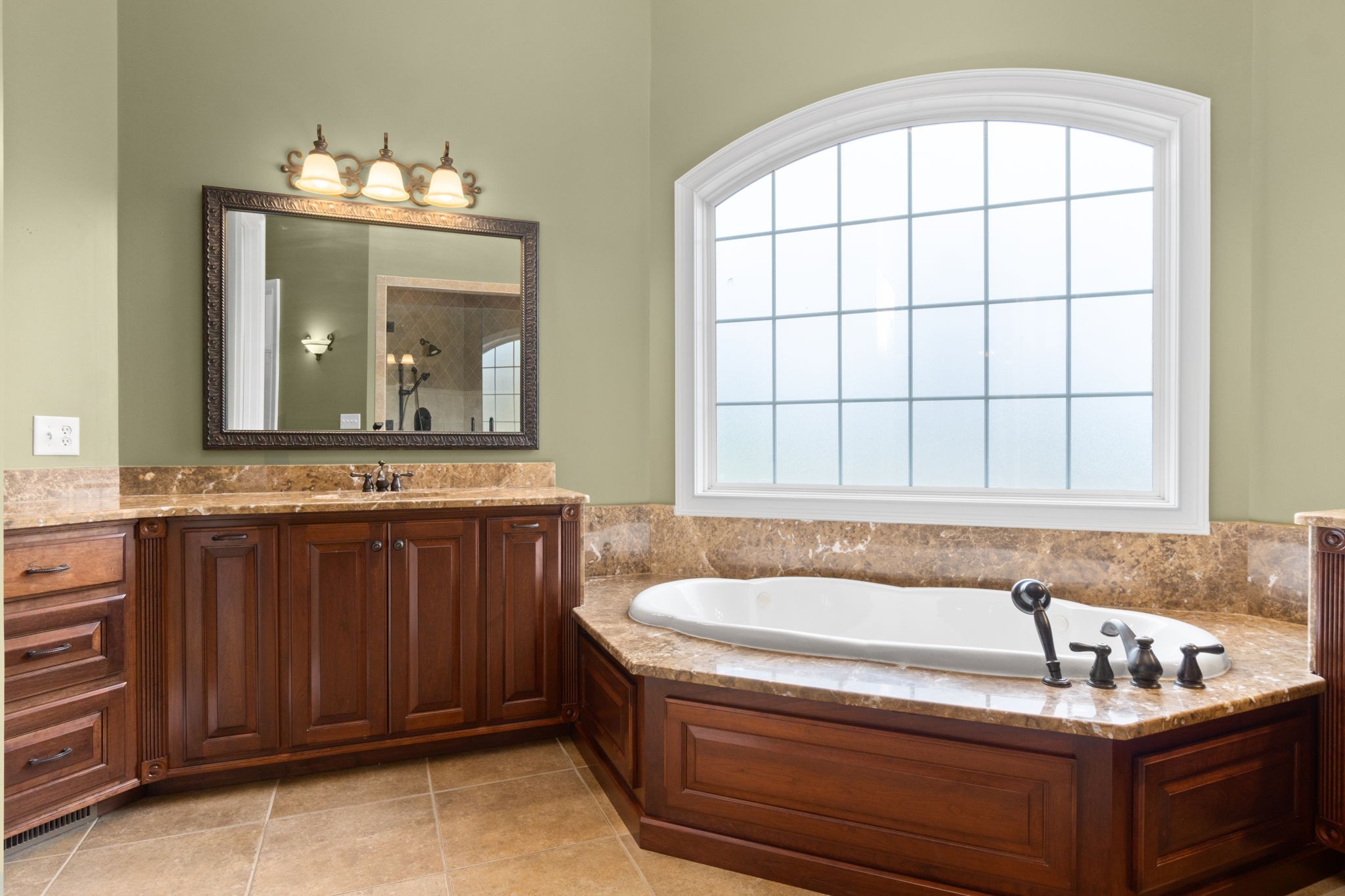 4591 Sango Road Clarksville, TN 37043 - Photo 31 of 70 a bathroom with a granite countertop tub sink and mirror