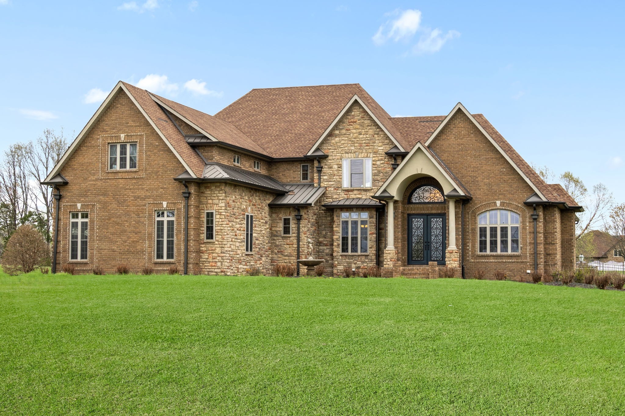 4591 Sango Road Clarksville, TN 37043 - Photo 4 of 70 a front view of a house with a yard