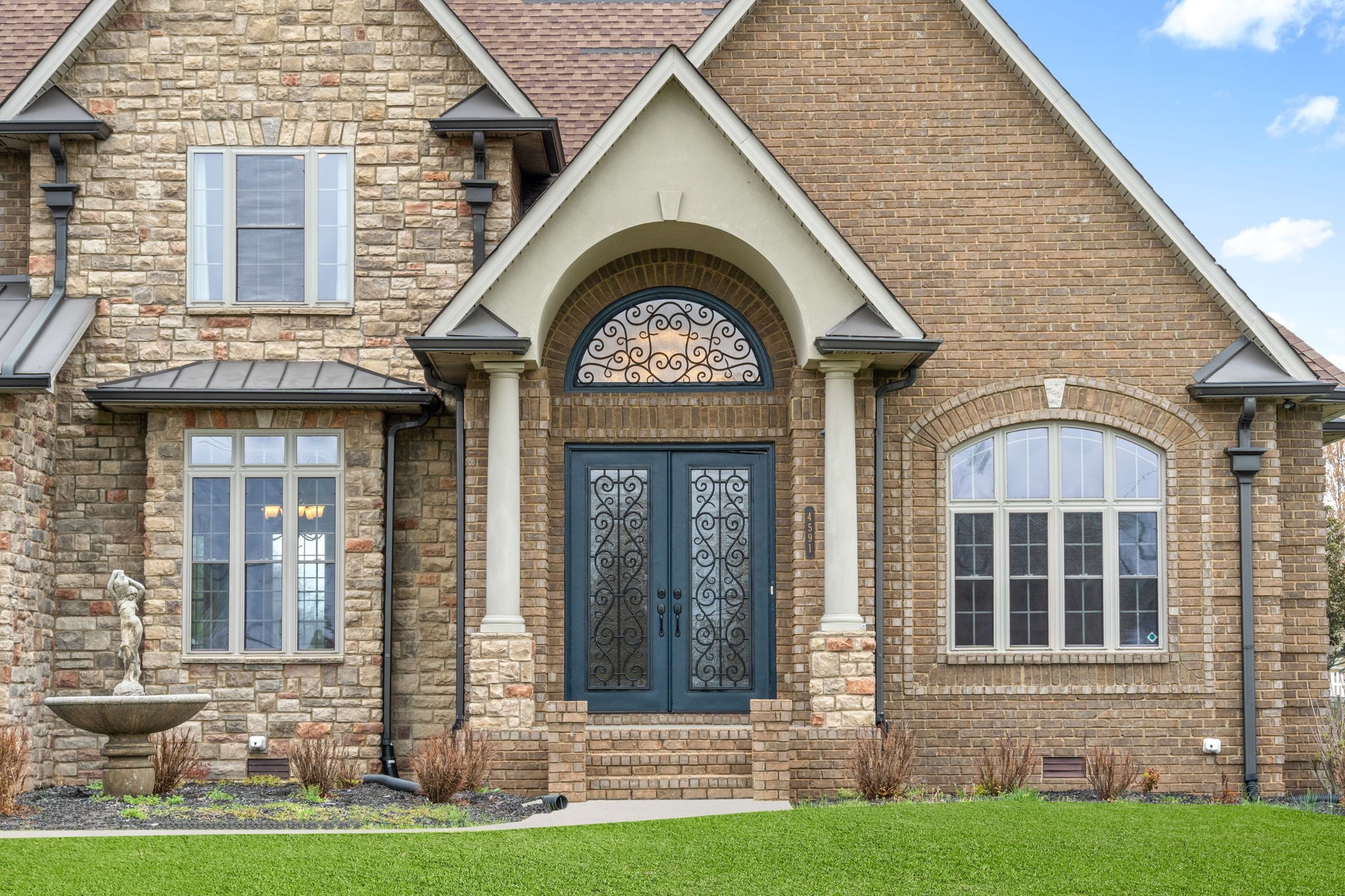 4591 Sango Road Clarksville, TN 37043 - Photo 5 of 70 a front view of a house with a yard