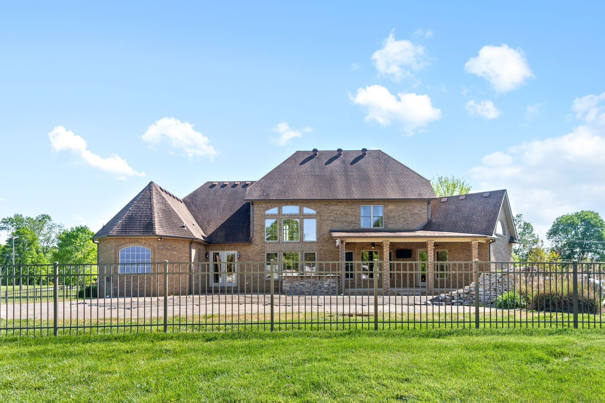 4591 Sango Road Clarksville, TN 37043 - Photo 65 of 70 a front view of a house with a garden and yard
