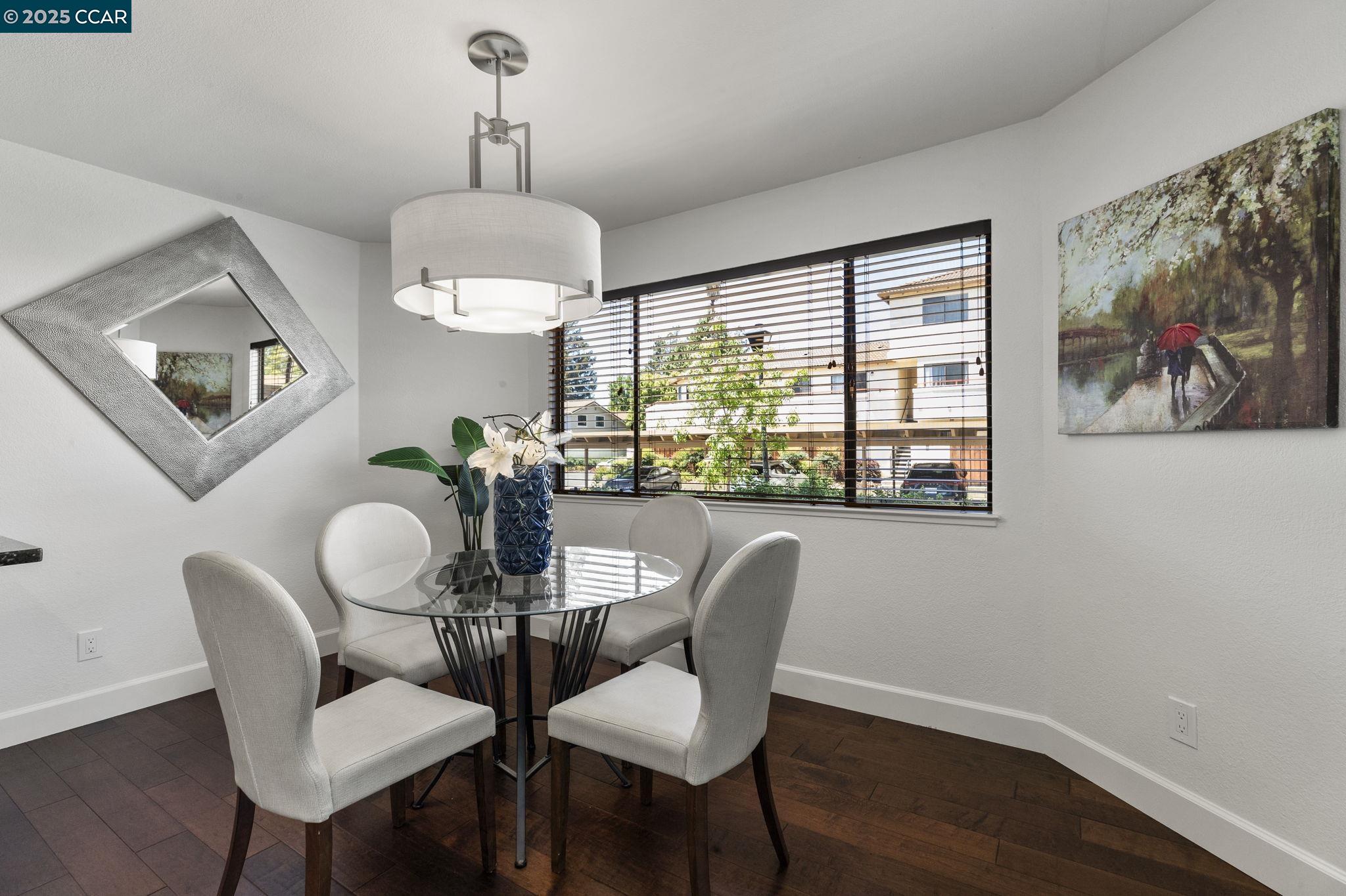 5050 Valley Crest Drive, Unit 63 Concord, CA 94521 - Photo 11 of 55 a dining room with furniture and window