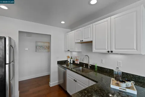 a kitchen with a stove and a microwave
