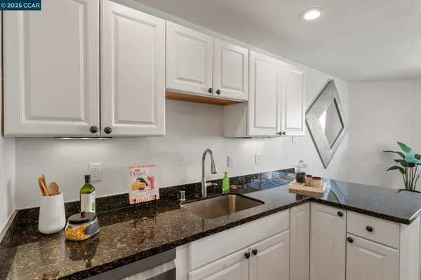 a bedroom with a bed and a table