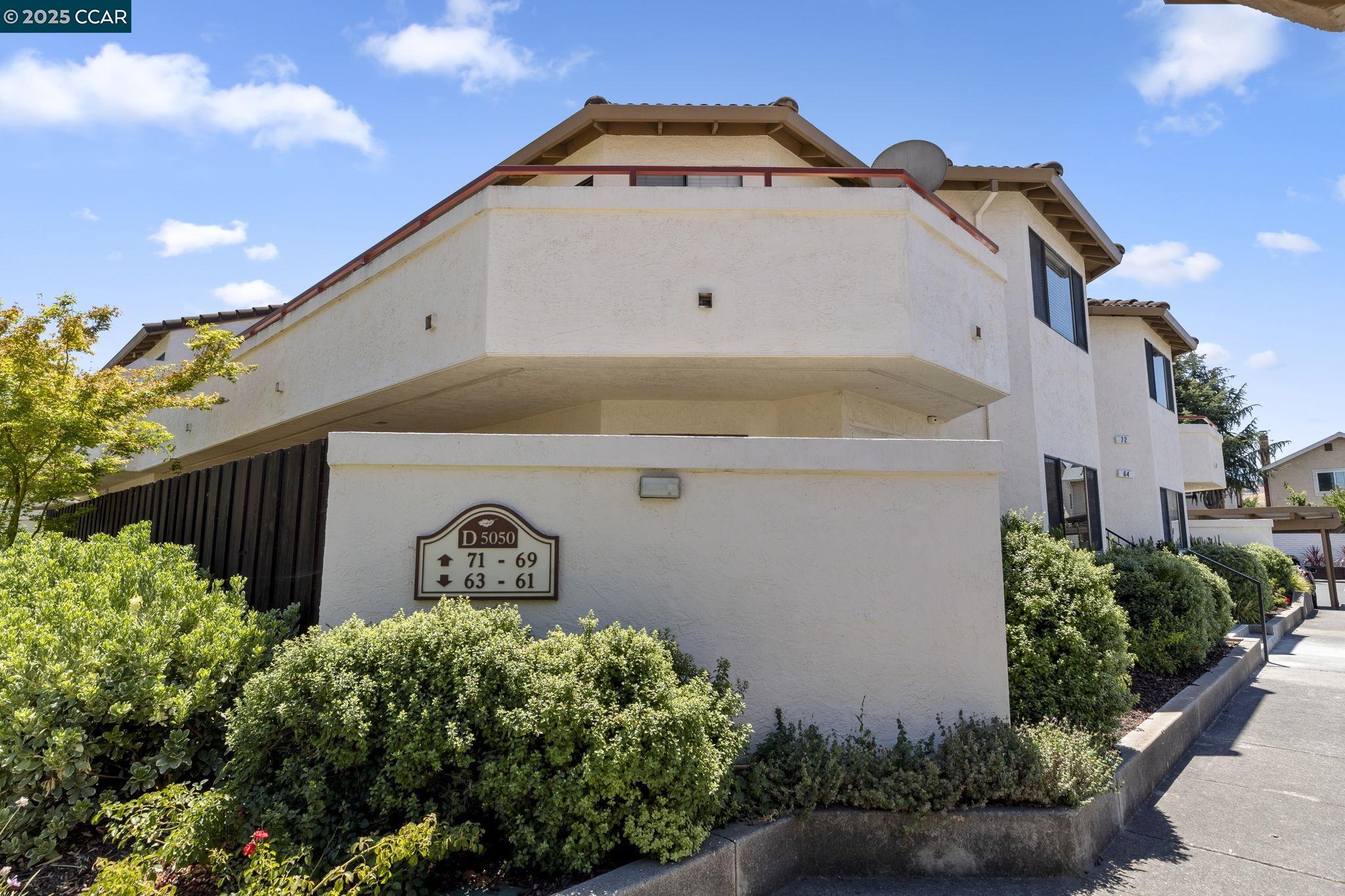 5050 Valley Crest Drive, Unit 63 Concord, CA 94521 - Photo 2 of 55 a view of a back yard of the house