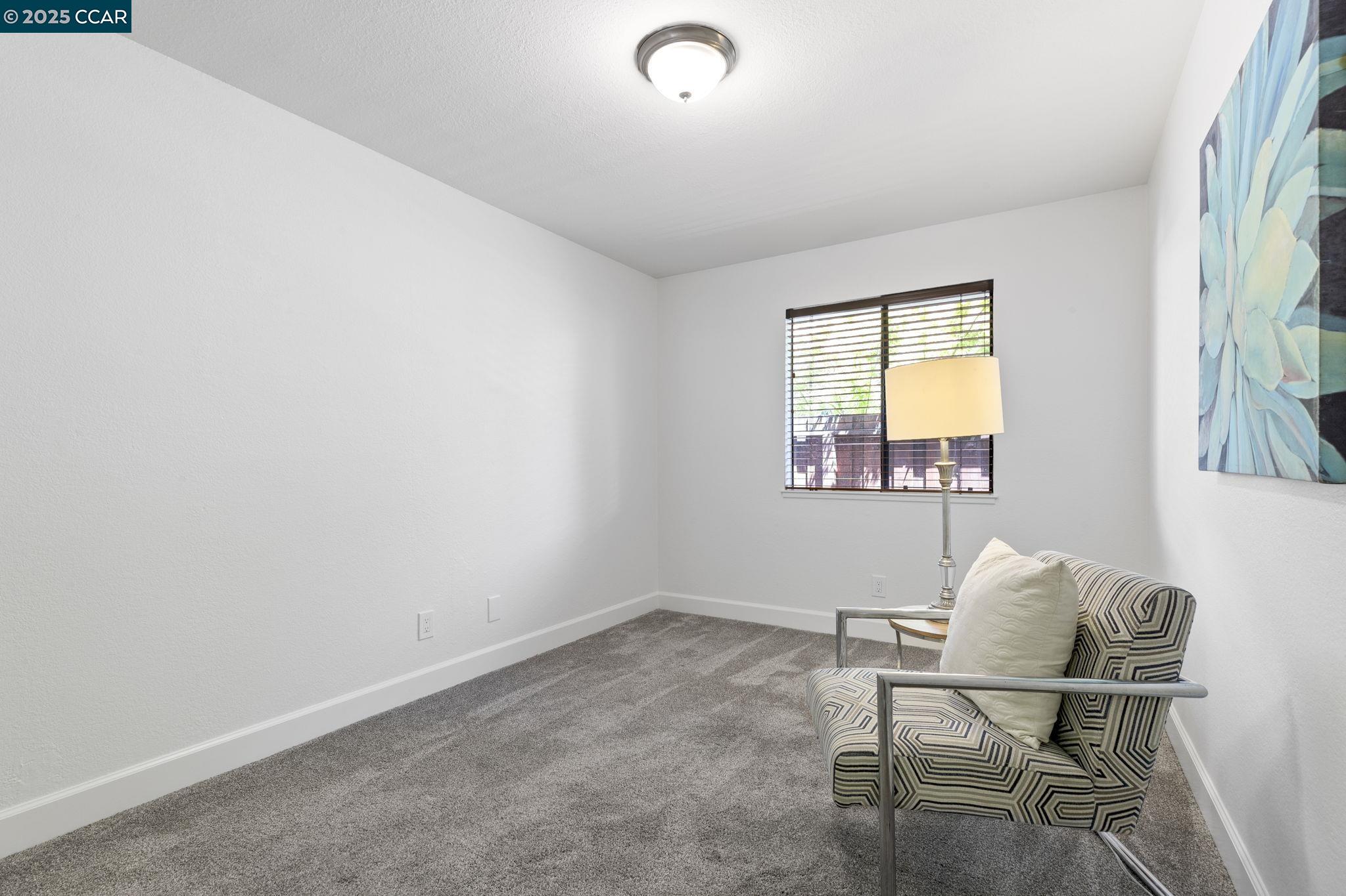 5050 Valley Crest Drive, Unit 63 Concord, CA 94521 - Photo 32 of 55 a workspace with a couch