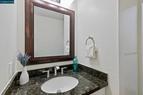 a view of a balcony with chairs