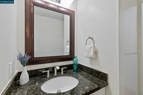 a view of a balcony with chairs