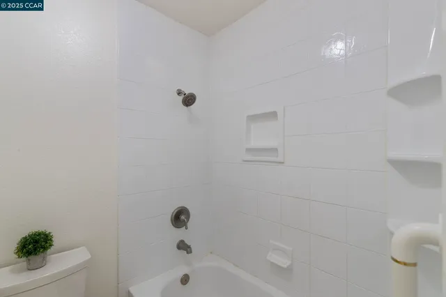 a view of a balcony with chairs