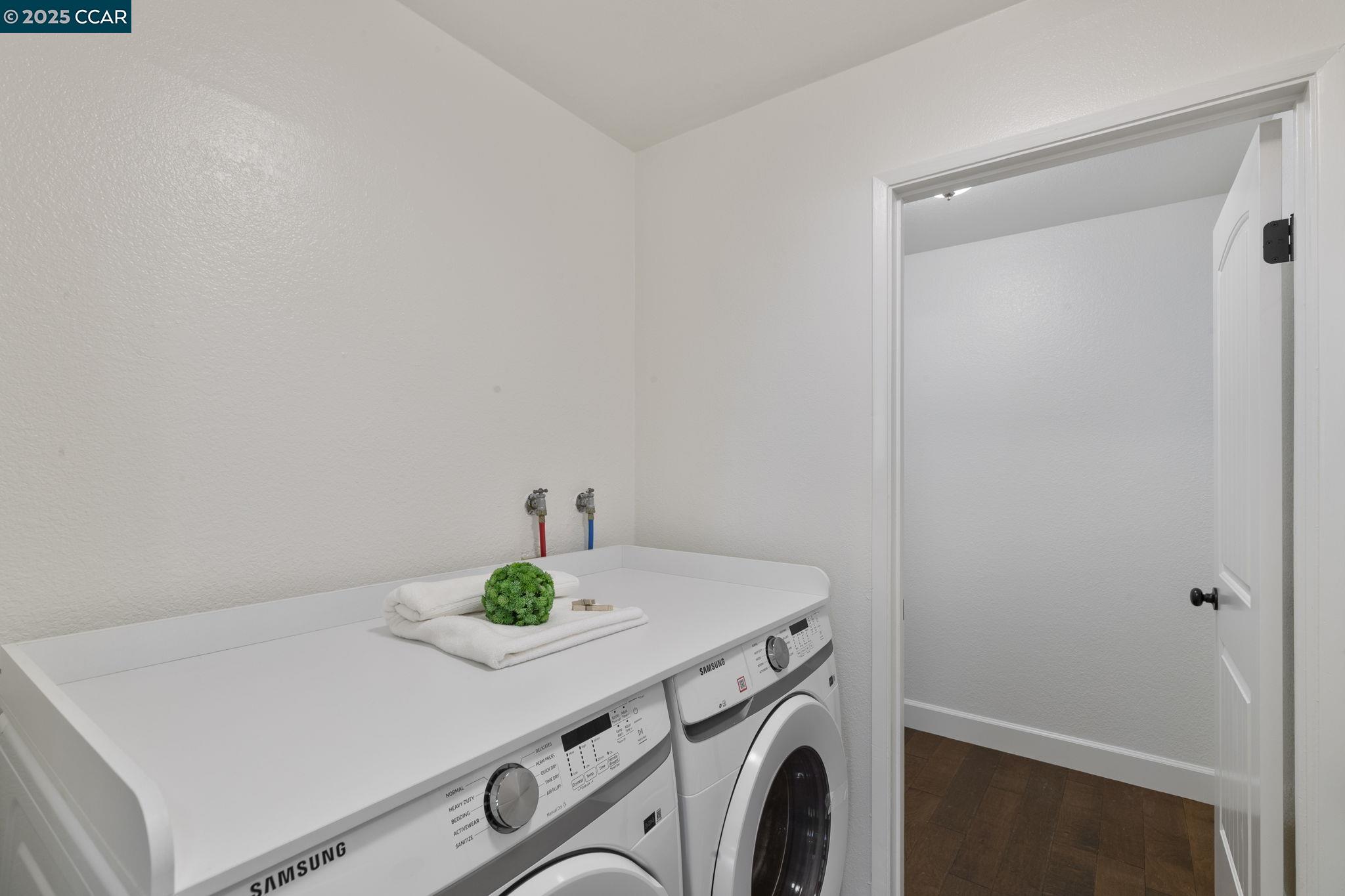 5050 Valley Crest Drive, Unit 63 Concord, CA 94521 - Photo 38 of 55 a utility room with dryer and washer