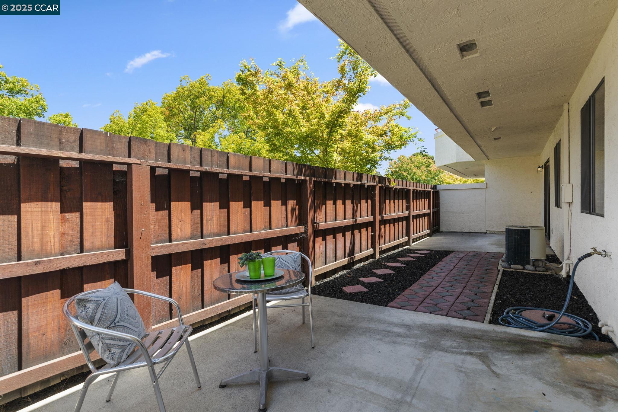 5050 Valley Crest Drive, Unit 63 Concord, CA 94521 - Photo 39 of 55 a view of a balcony with chairs