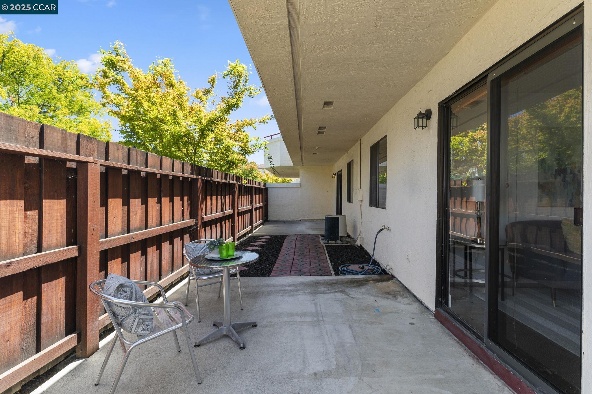 5050 Valley Crest Drive, Unit 63 Concord, CA 94521 - Photo 40 of 55 a view of a balcony with chairs