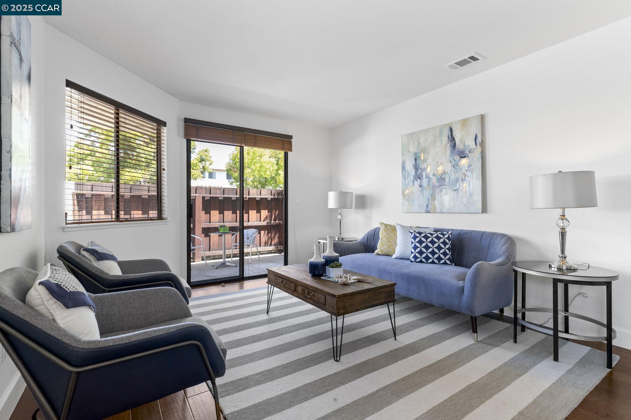 5050 Valley Crest Drive, Unit 63 Concord, CA 94521 - Photo 6 of 55 a living room with furniture and a window
