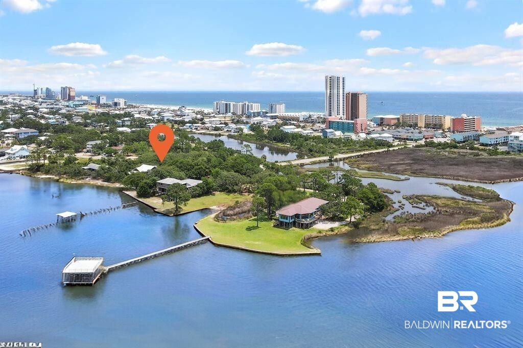 544 Windmill Ridge Road Gulf Shores, AL 36542 - Photo 2 of 50 Peace and Privacy on .64 acres with 106' of Lagoon Frontage all USACE et alt permits in place. .2 mi from the Gulf of America