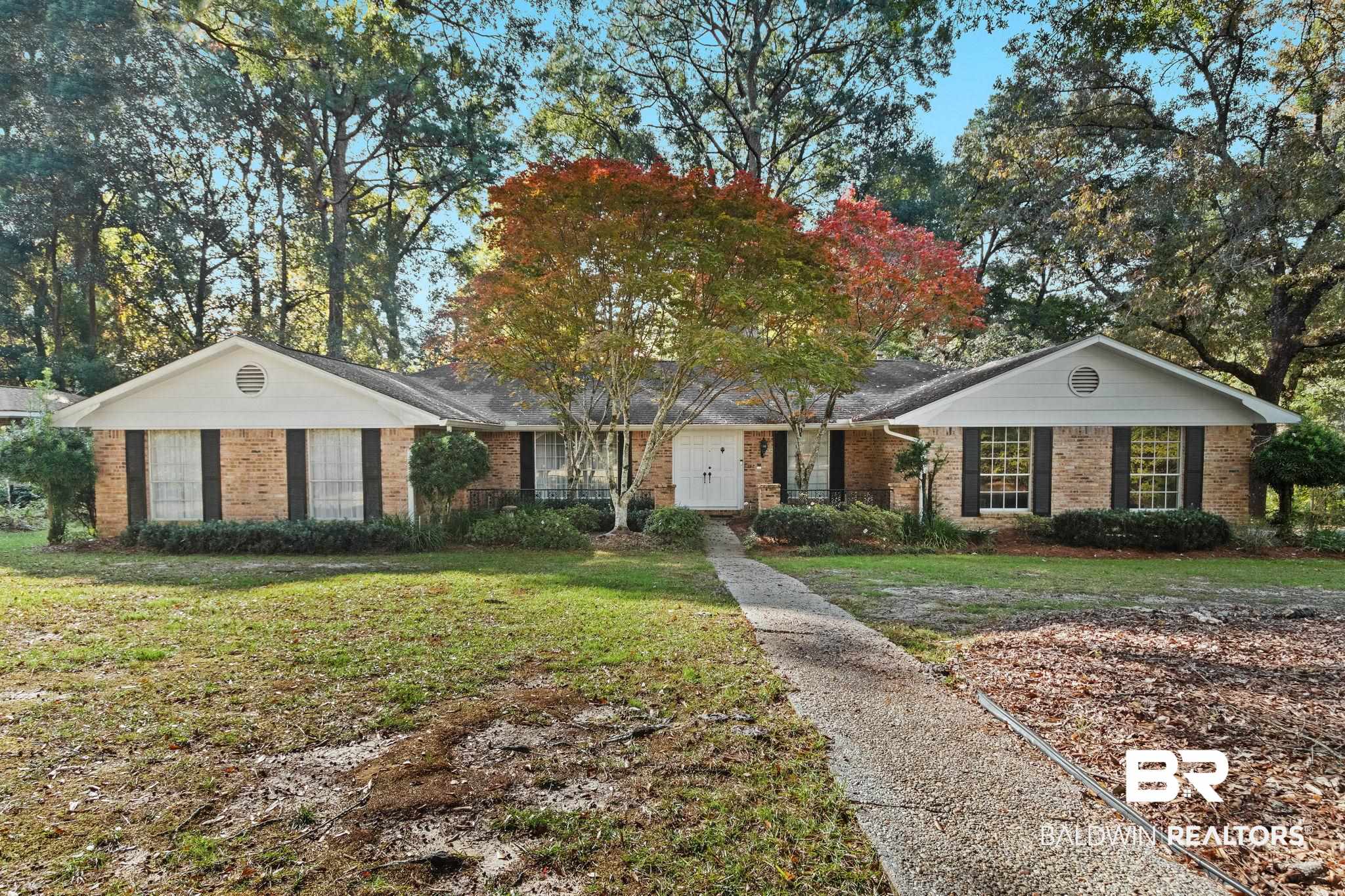 752 Evergreen Street Fairhope, AL 36532 - Photo 1 of 100 Ranch-style home with a front lawn and brick siding