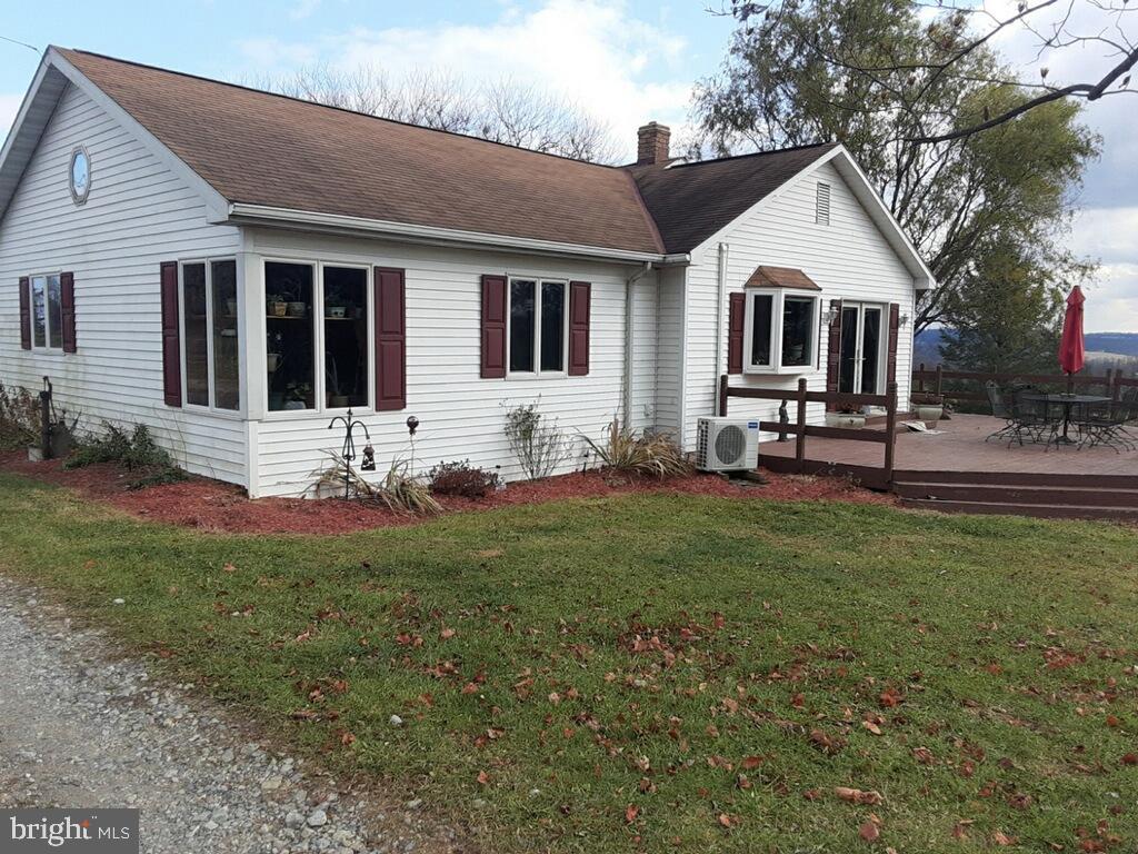 9839 Orchard Road Spring Grove, PA 17362 - Photo 1 of 5 a front view of a house with a yard