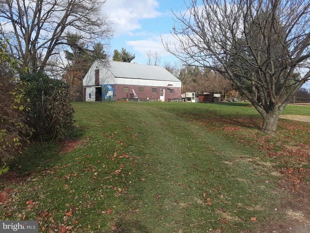 9839 Orchard Road Spring Grove, PA 17362 - Photo 5 of 5 a view of a house with a yard