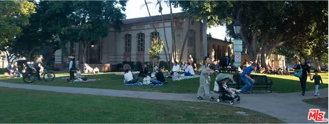 a front view of a building with swimming pool