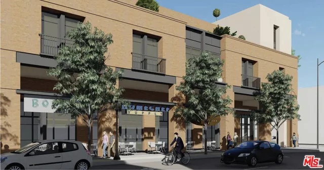 a view of a street with cars