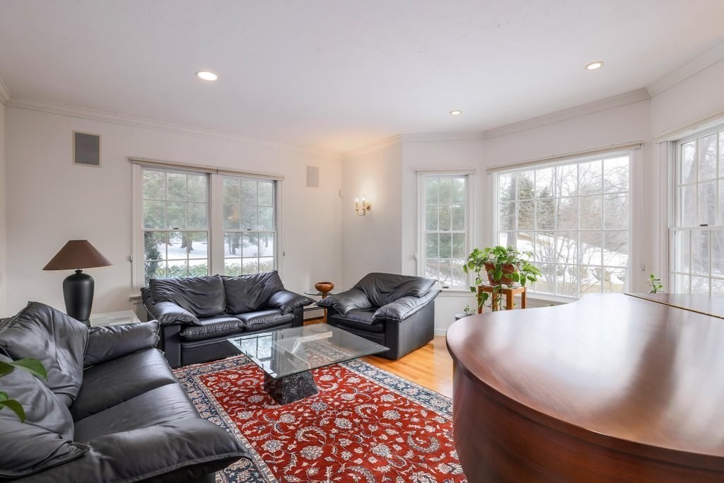 16 Steel Road Hopedale, MA 01747 - Photo 12 of 42 a living room with furniture and a large window