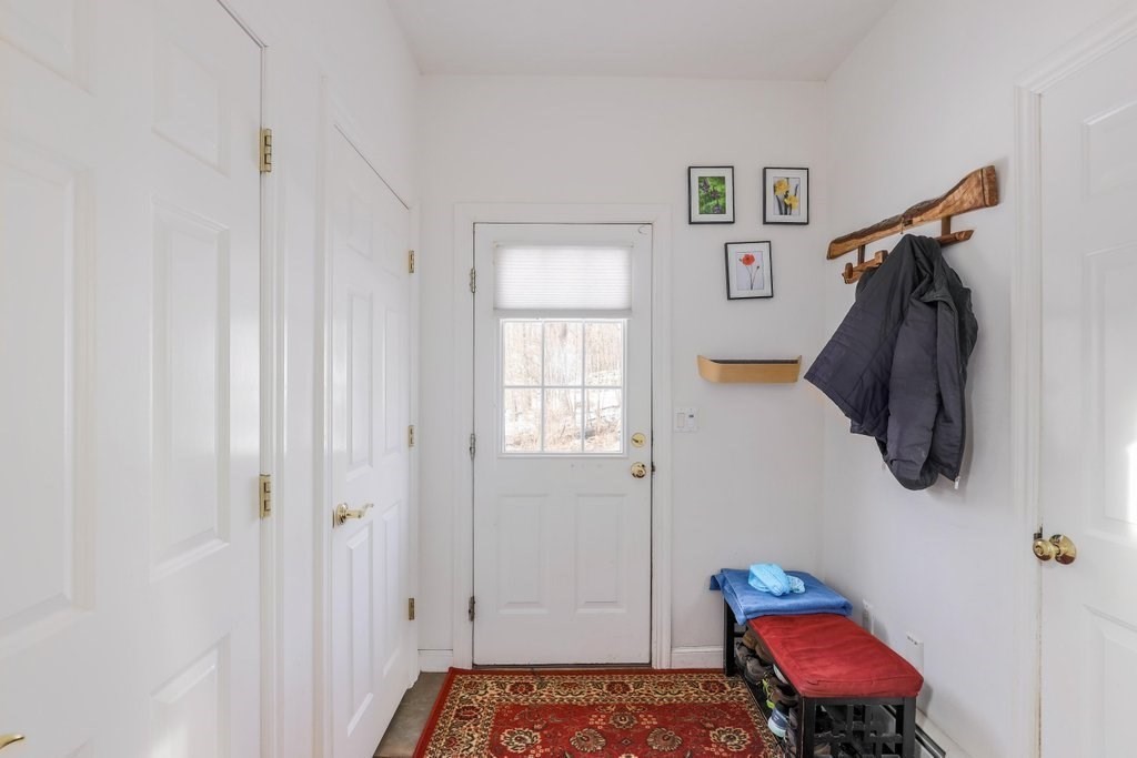 16 Steel Road Hopedale, MA 01747 - Photo 16 of 42 a bedroom with a bed and a window