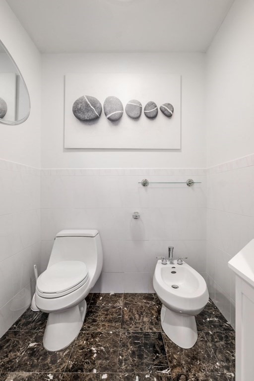 16 Steel Road Hopedale, MA 01747 - Photo 21 of 42 a bathroom with a toilet and a sink