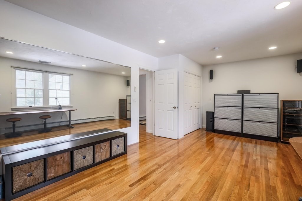16 Steel Road Hopedale, MA 01747 - Photo 28 of 42 a living room with stainless steel appliances kitchen island hardwood floor and a window