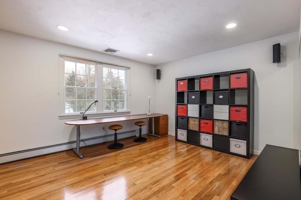 16 Steel Road Hopedale, MA 01747 - Photo 29 of 42 a room with lots of wooden furniture and a table