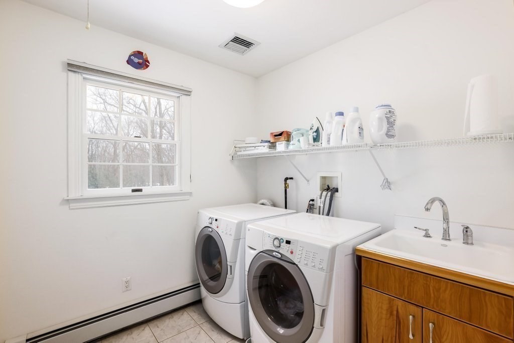 16 Steel Road Hopedale, MA 01747 - Photo 31 of 42 a utility room with dryer and washer