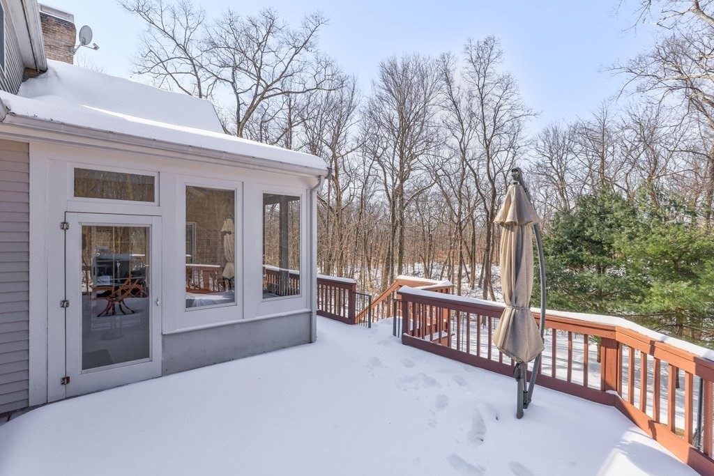 16 Steel Road Hopedale, MA 01747 - Photo 36 of 42 a view of a house with a wooden deck and a backyard