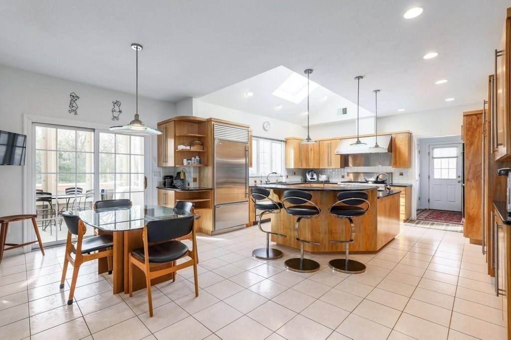 16 Steel Road Hopedale, MA 01747 - Photo 6 of 42 a dining table chairs and a view of kitchen