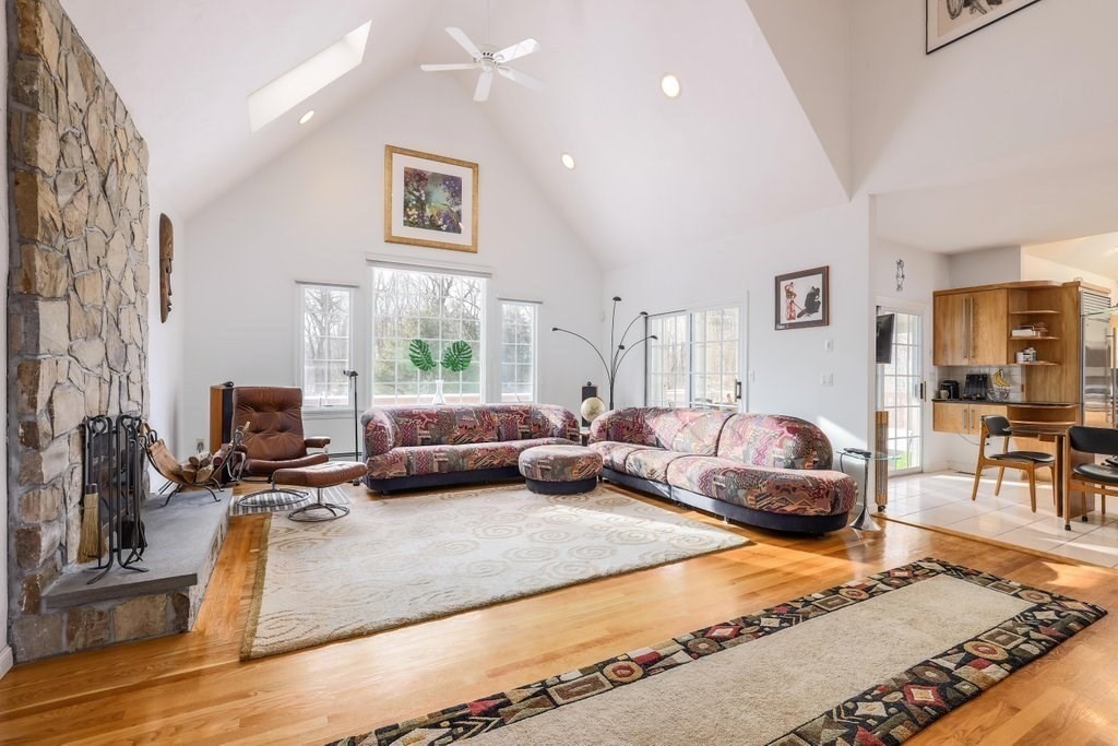 16 Steel Road Hopedale, MA 01747 - Photo 7 of 42 a living room with furniture and a flat screen tv