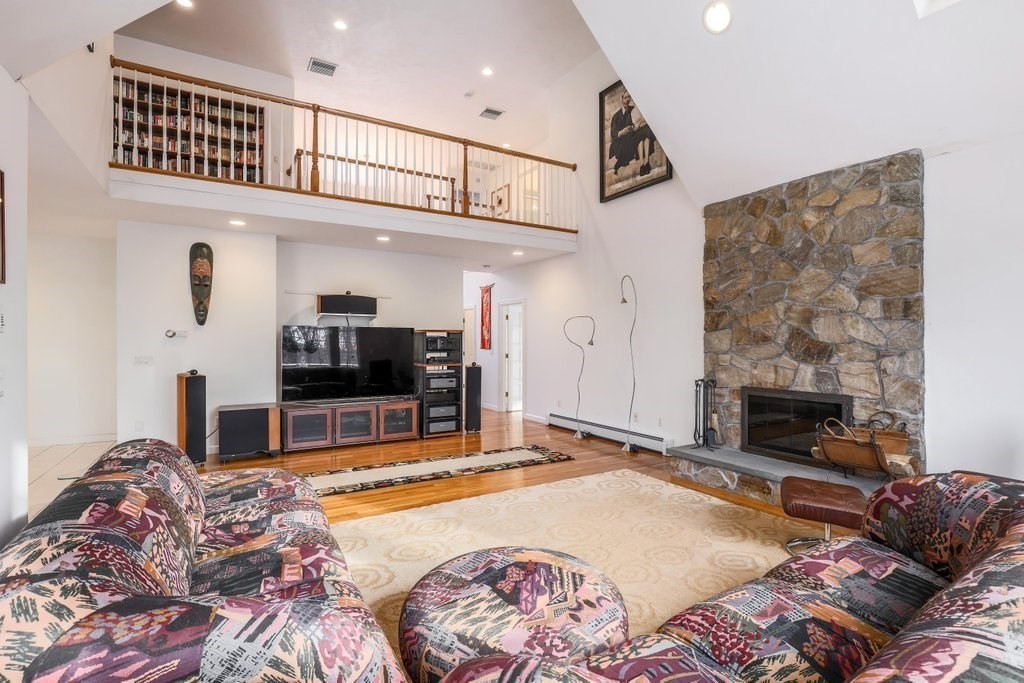 16 Steel Road Hopedale, MA 01747 - Photo 8 of 42 a living room with furniture and a fireplace