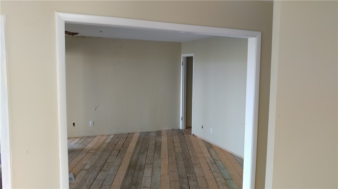 3106 Sea Marsh Road Fernandina Beach, FL 32034 - Photo 3 of 5 an empty room with wooden floor