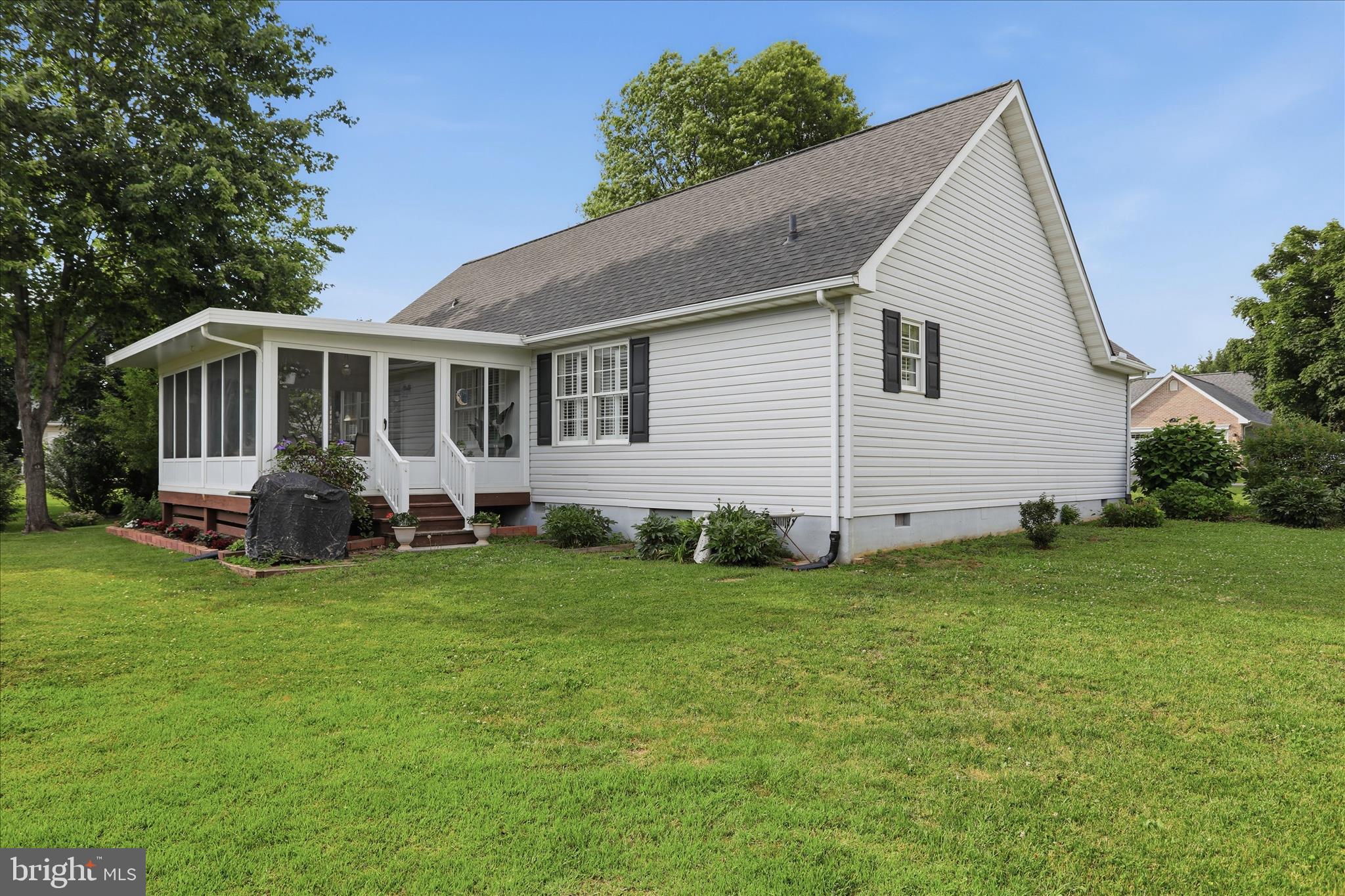 96 Phoenix Lane Falling Waters, WV 25419 - Photo 32 of 37 a view of a house with a backyard