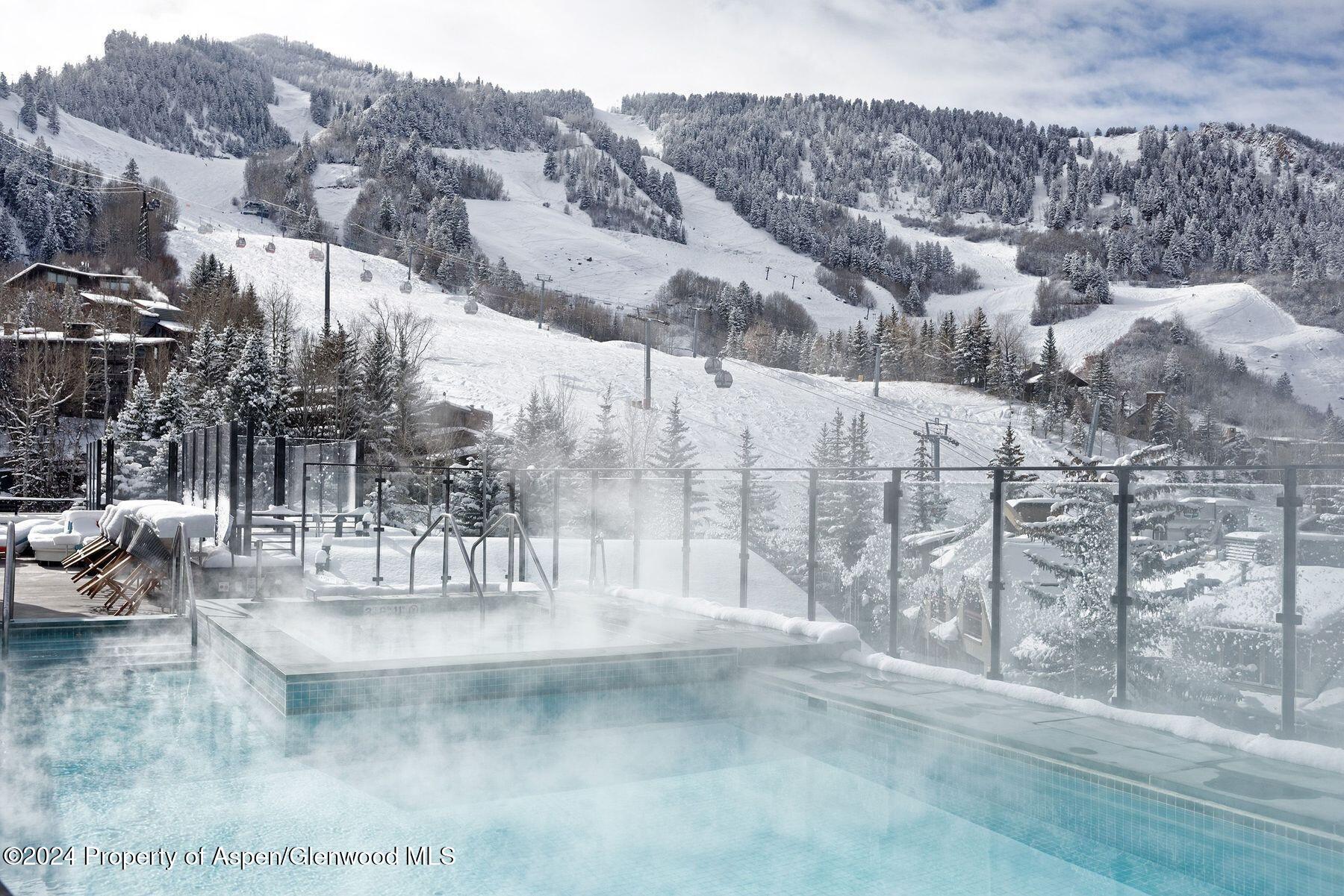 550 South Spring Street Aspen, CO 81611 - Photo 19 of 20 a view of a city from a terrace