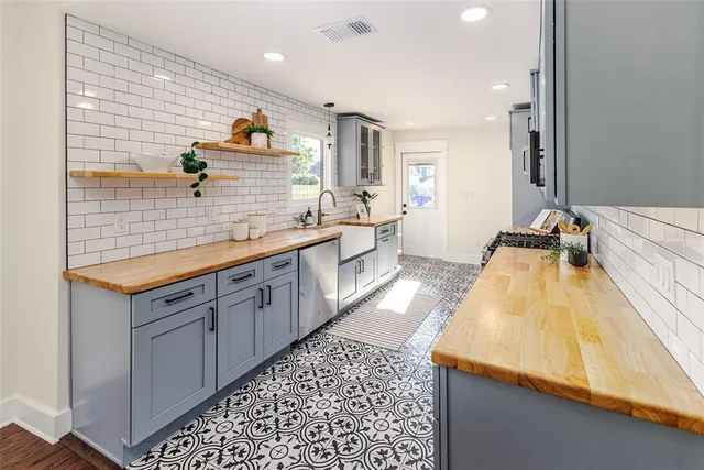 a spacious bathroom with a sink and a bathtub