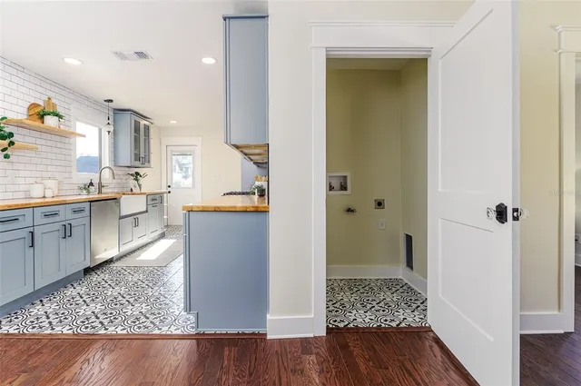 a view of kitchen with wooden floor