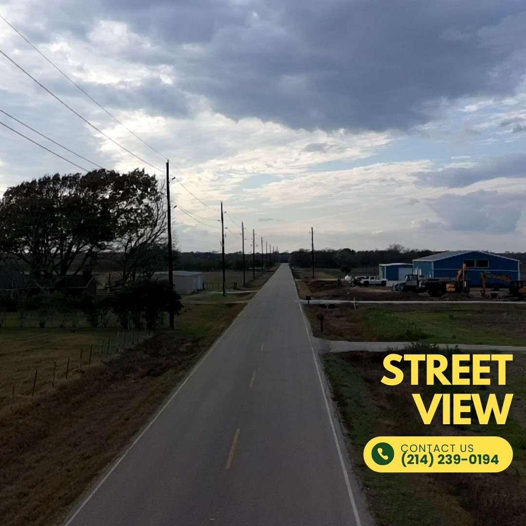Bj Dusek Road Wallis, TX 77485 - Photo 5 of 17 a view of a street with an ocean view