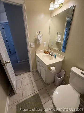 a room with lots of furniture and windows