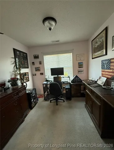 a living room with furniture window and a lamp