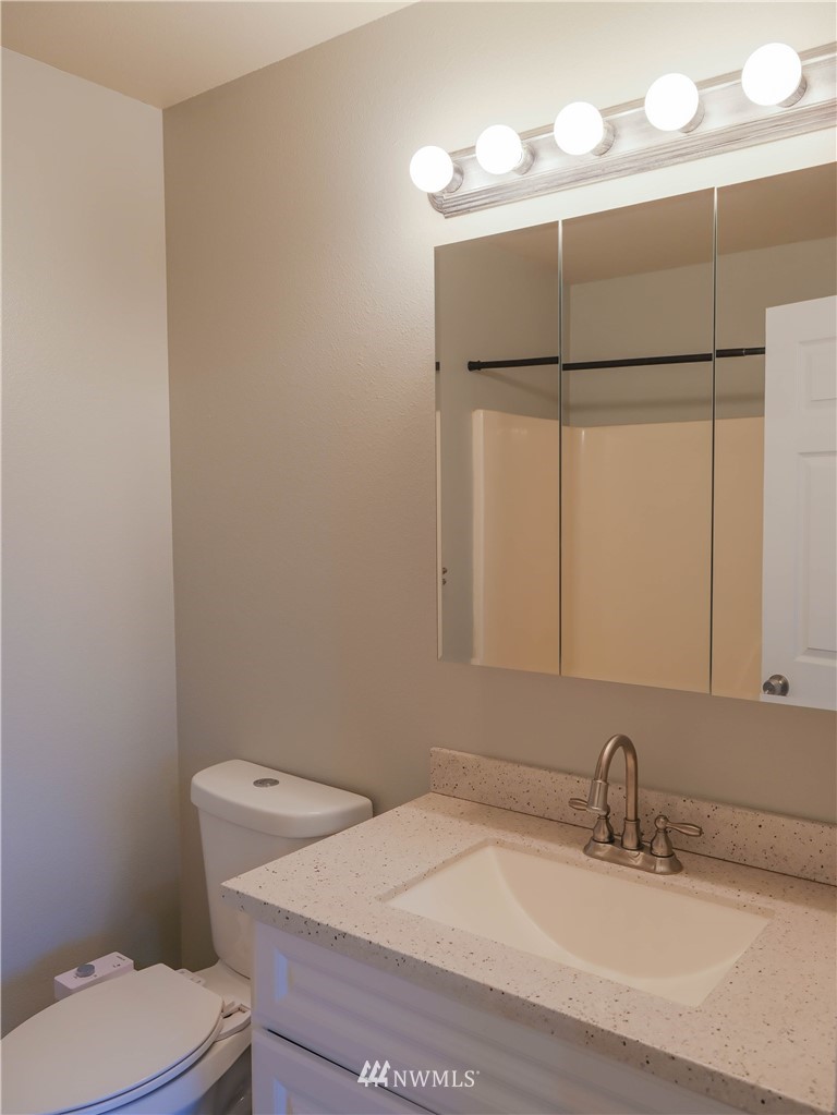 18041 Daryl Lane Southwest Rochester, WA 98579 - Photo 19 of 29 a bathroom with a sink and a toilet
